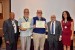 Prof. Thomas Marlowe and Prof. Andres Tremante receiving the certificate and the medal of their designation as "Inter-Disciplinary Communication" Fellow of the IIIS.